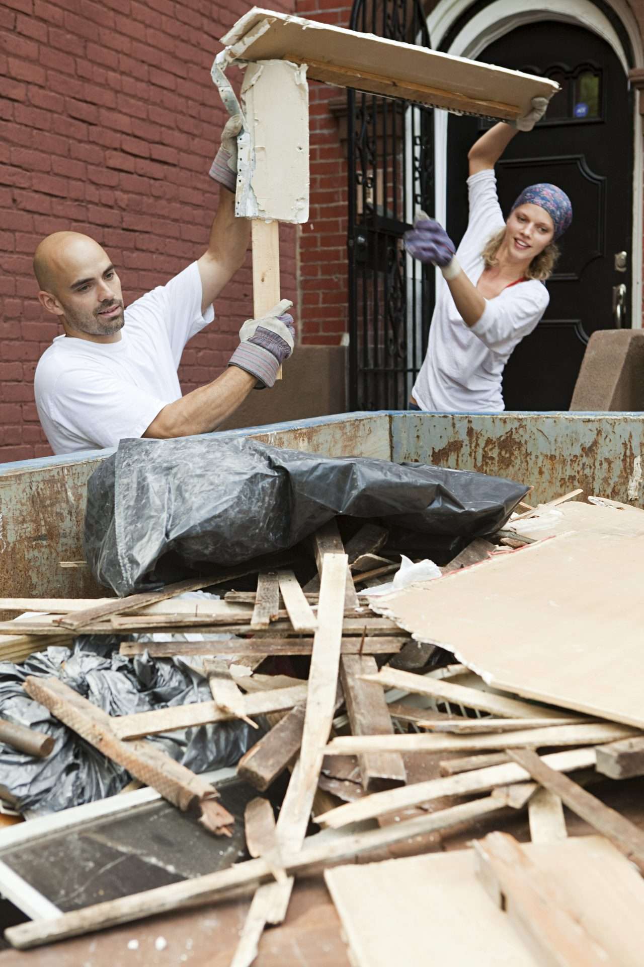 Home 9 hardworking team clearing renovation debris 2025 04 03 07 29 06 utc scaled