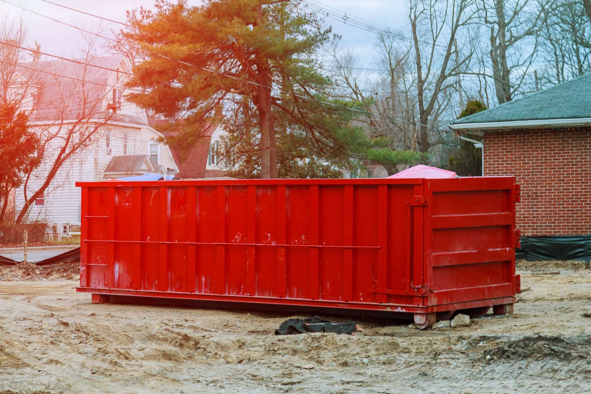 10 Yard Dumpster Rentals 2 loaded dumpster near a construction site home ren 2025 04 02 14 20 38 utc 1 scaled